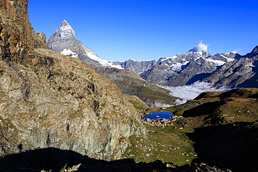 Matterhorn and Dent Blanche and the blue waters of Lake Riffelsee, Zermatt, Canton of Valais, Pennine Alps, Swiss Alps, Switzerland, Europe