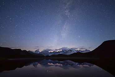 Starry summer sky on Fenetre Lakes and the high peaks, Ferret Valley, Saint Rhemy, Grand St Bernard, Aosta Valley, Italy, Europe