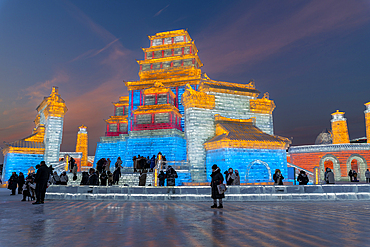 Illuminated buildings made out of ice, Ice International Ice and Snow Sculpture Festival, Harbin, Heilongjiang, China, Asia