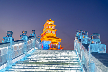 Illuminated buildings made out of ice, Ice International Ice and Snow Sculpture Festival, Harbin, Heilongjiang, China, Asia