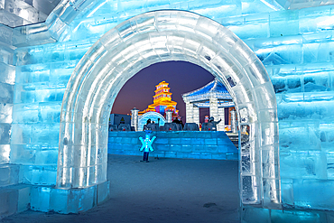 Illuminated buildings made out of ice, Ice International Ice and Snow Sculpture Festival, Harbin, Heilongjiang, China, Asia