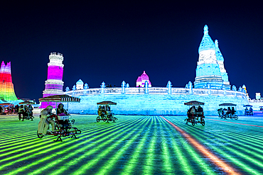 Illuminated buildings made out of ice, Ice International Ice and Snow Sculpture Festival, Harbin, Heilongjiang, China, Asia