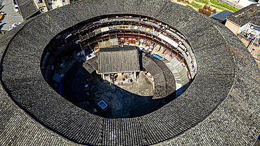 Aerial of Taxia village and Fujian Tulou, rural dwelling of the Hakka, Fujian, China, Asia