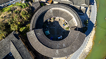 Aerial of Taxia village and Fujian Tulou, rural dwelling of the Hakka, Fujian, China, Asia