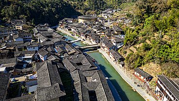 Aerial of Taxia village and Fujian Tulou, rural dwelling of the Hakka, Fujian, China, Asia