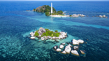 Aerial of Old Indie Lighthouse, Lengkuas Island, Belitung island off the coast of Sumatra, Indonesia, Southeast Asia, Asia