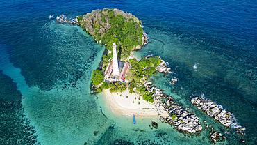 Aerial of Old Indie Lighthouse, Lengkuas Island, Belitung island off the coast of Sumatra, Indonesia, Southeast Asia, Asia