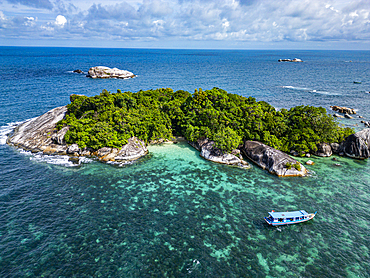 Aerial of little Keciput granite rock island, Belitung island off the coast of Sumatra, Indonesia, Southeast Asia, Asia