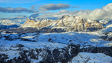 Rocky peaks and snow covered forest, Dolomites, Italy, Europe