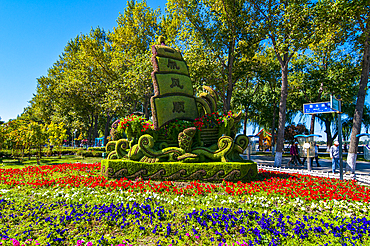 Flood monument in form of flowers in floral display, Harbin, Heilongjiang, China, Asia