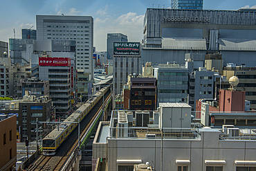 Subway line going straight through the skyscrapers of Tokyo,Honshu, Japan, Asia