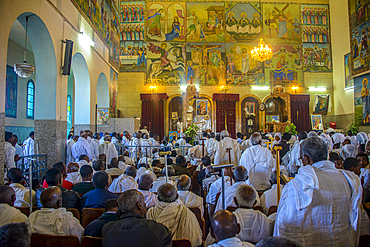 Orthodox men praying in the Coptic Cathedral of St. Mariam, Asmara, Eritrea, Africa