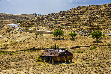 Old Ethiopian tank rusting along the road between Asmara and Keren, Eritrea, Africa