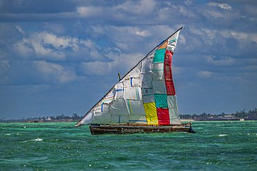 Traditional Dhow sailing off the coast of the Island of Mozambique, Mozambique, Africa