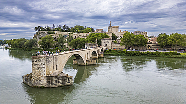 Aerial of the historic Bridge of Saint Benezet (Pont d'Avignon) with the historic city, Avignon, UNESCO World Heritage Site, Vaucluse, Provence-Alpes-Cote d'Azur, France, Europe