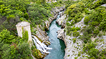 Aerial of an old watchtower in the Herault gorge, UNESCO World Heritage Site, Causses and Cevennes, Herault, Occitanie, France, Europe