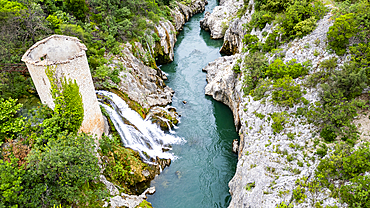 Aerial of an old watchtower in the Herault gorge, UNESCO World Heritage Site, Causses and Cevennes, Herault, Occitanie, France, Europe