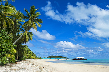 Traditional wood carved boat in the Aitutaki lagoon, Rarotonga and the Cook Islands, South Pacific, Pacific