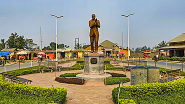 Historic buildings around the main square, statue of Matata Ponyo of Maniema, Kindu, Maniema, Democratic Republic of Congo, Africa