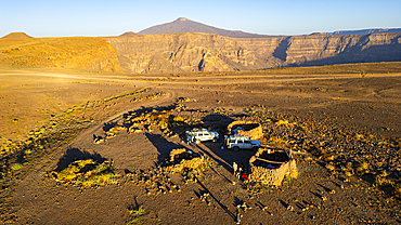 Aerial over Trou du Natron with volcano Tousside in the background, Tibesti Mountains, Chad, Africa