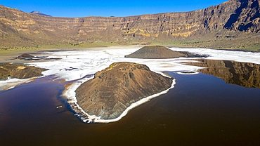 Aerial of the Trou du Natron volcanic crater and its natron lakes, Tibesti Mountains, Chad, Africa