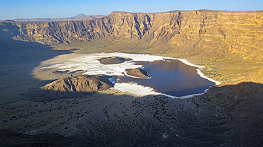 Aerial of the Trou du Natron volcanic crater and its natron lakes, Tibesti Mountains, Chad, Africa