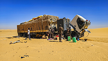 Truck stuck in the sand dunes of the Tibesti Mountains, Chad, Africa