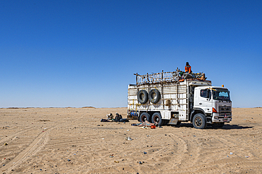 Truck stuck in the sand dunes of the Tibesti Mountains, Chad, Africa