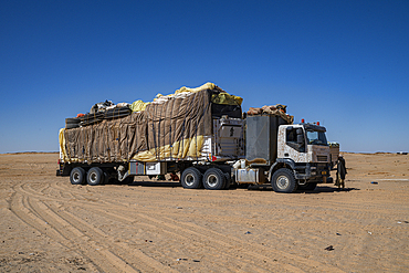 Truck stuck in the sand dunes of the Tibesti Mountains, Chad, Africa