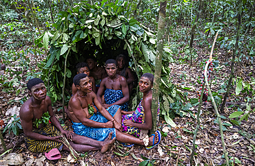 Pygmy women sitting in a dwelling, Unesco site Dzanga Sangha National Park, Central African Republic