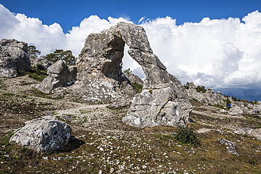 Beautiful arch at Legravsporten sea stacks, Gotland, Sweden, Scandinavia, Europe