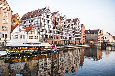 Hanseatic League houses on the Motlawa River at sunset, Gdansk, Poland, Europe