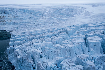 Aerial of the massive glacier of Alexandra Land, Franz Josef Land archipelago, Arkhangelsk Oblast, Arctic, Russia, Europe