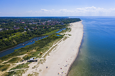 Aerial by drone of the white sand beach of Yantarny, Kaliningrad, Russia, Europe