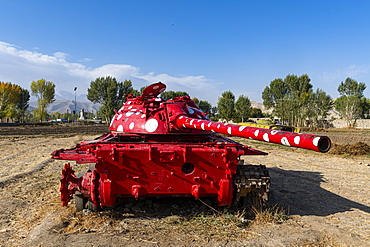 Old soviet tank painted in funky colours, Bamyan, Afghanistan, Asia