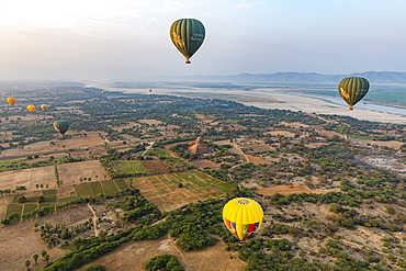 Hot air balloon at sunrise over temples of Bagan (Pagan), Myanmar (Burma), Asia