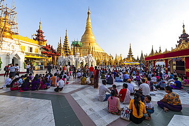 Pilgrims in the Shwedagon pagoda, Yangon (Rangoon), Myanmar (Burma), Asia