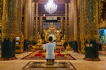 Pilgrims in the Shwedagon pagoda, Yangon (Rangoon), Myanmar (Burma), Asia