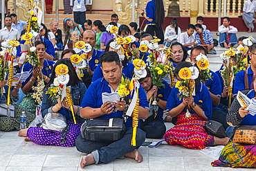 Pilgrims in the Shwedagon pagoda, Yangon (Rangoon), Myanmar (Burma), Asia