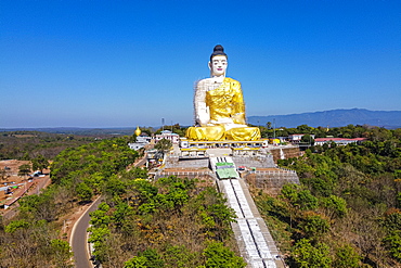 Aerial of a giant sitting Buddha below the Kyaiktiyo Pagoda (Golden Rock), Mon state, Myanmar (Burma), Asia