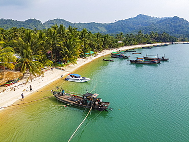 Aerial by drone of a Moken, sea gypsy village on a white sand beach, Mergui (Myeik) Archipelago, Myanmar (Burma), Asia