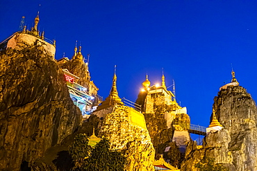 Taung Kew Paya built on rocks, after sunset, Loikaw, Kayah state, Myanmar (Burma), Asia