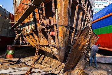 Men at an open boat, shipwreck cemetery (ship breaking yard), Port of Dhaka, Bangladesh, Asia