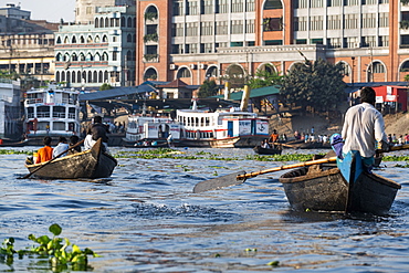 Man rowing his canoe, Port of Dhaka, Bangladesh, Asia