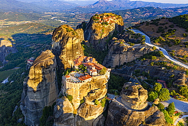 Aerial by drone of the Holy Monastery of Varlaam at sunrise, UNESCO World Heritage Site, Meteora Monasteries, Greece, Europe