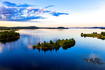 Clouds reflecting at sunset on Lake Inari, Inari, Lapland, northern Finland, Europe