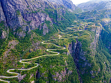 Zigzag road leading down to Lysebodn, at the end of Lystrefjord (Lysefjord), Rogaland, Norway, Scandinavia, Europe