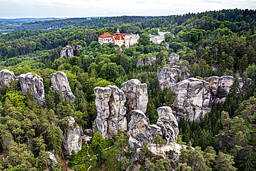 Aerial of Rock town of Hruba Skala with the castle in the background, Bohemian Paradise, Czech Republic, Europe