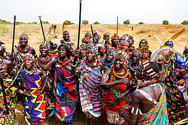 Traditional dressed women of the Jiye tribe dancing and singing, Eastern Equatoria State, South Sudan, Africa