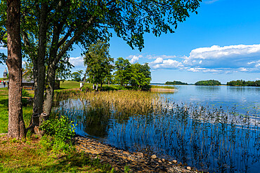 Reflecting waters in a little bay, Kizhi Island, Karelia, Russia, Europe